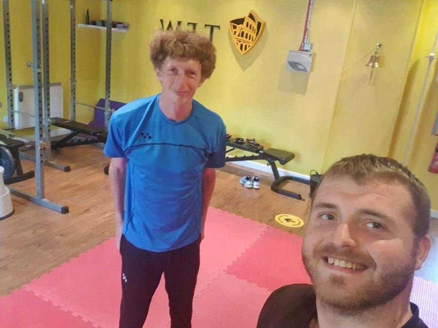 Jordan Squires training with a client