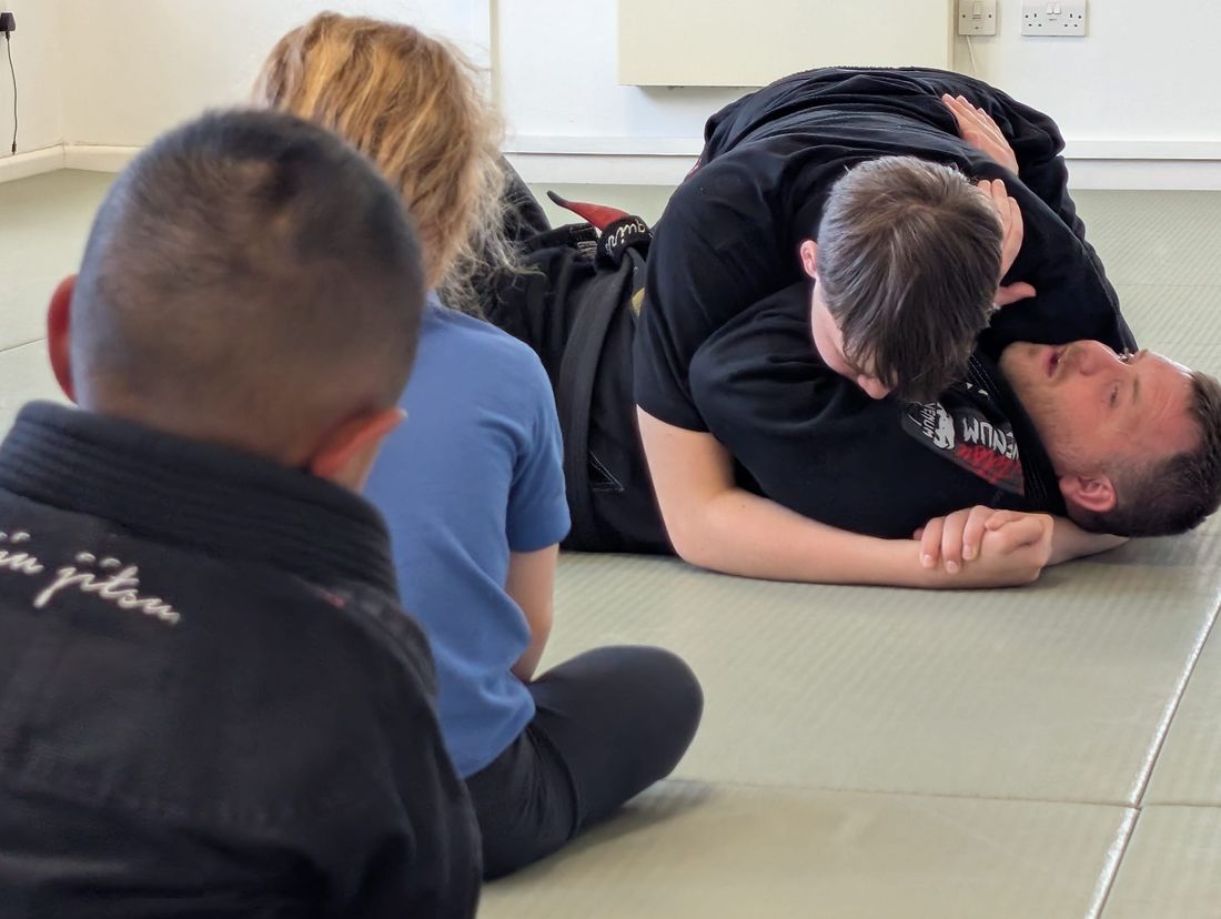 Children taking part in games and activities at a Squires Martial Arts holiday camp